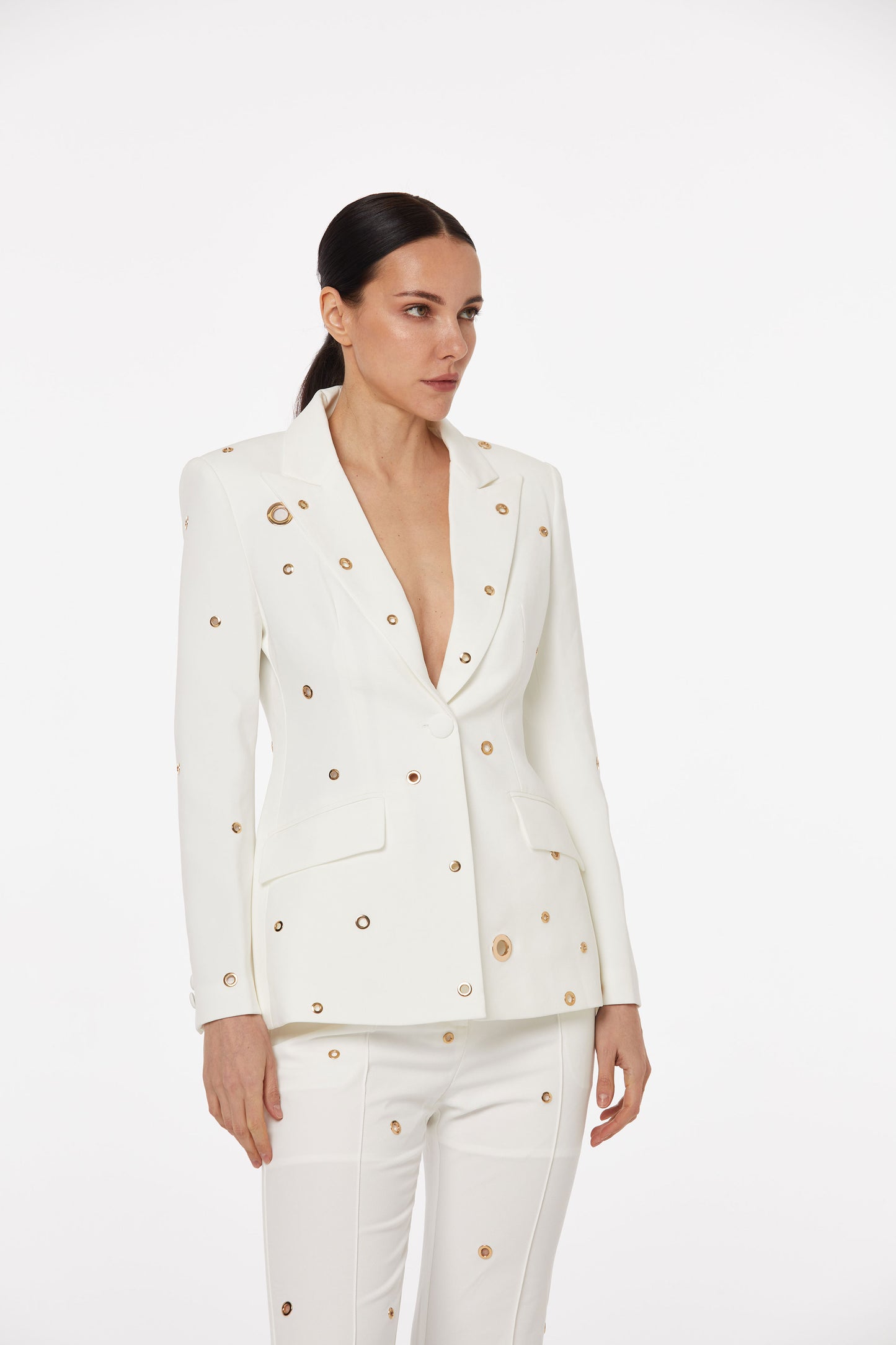 White pantsuit set with gold embellishment