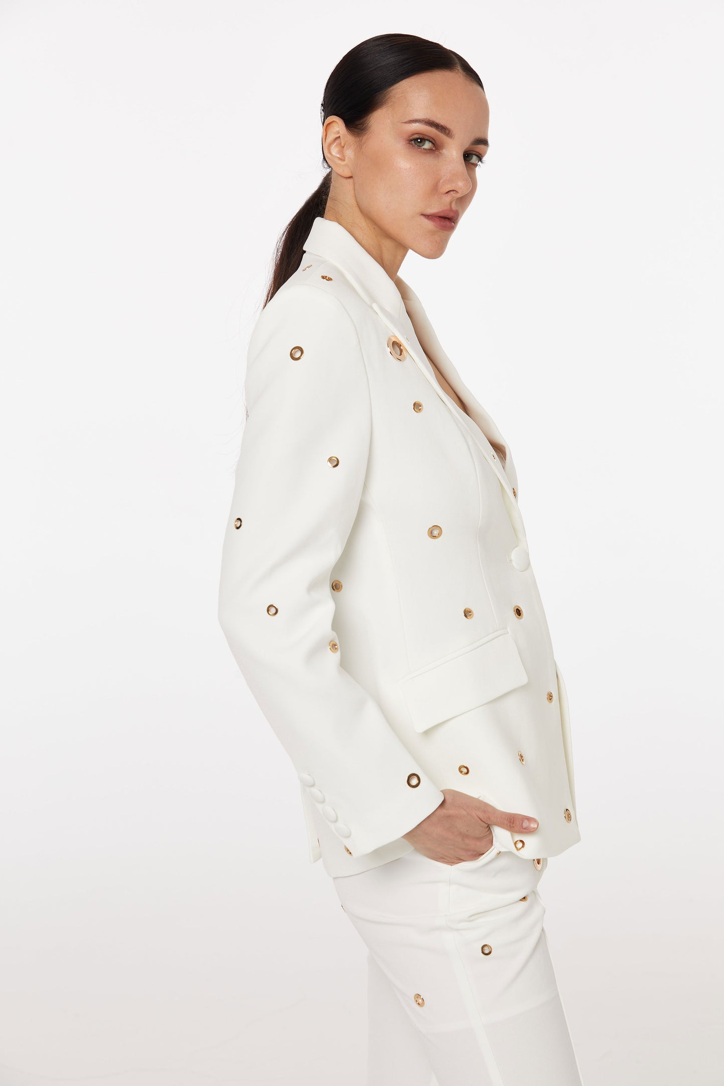 White pantsuit set with gold embellishment