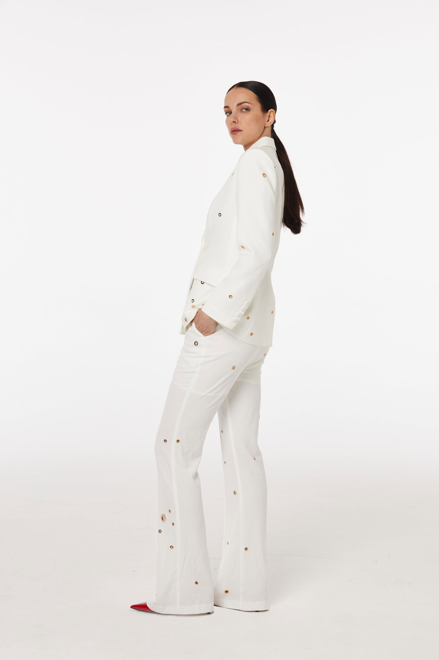 White pantsuit set with gold embellishment